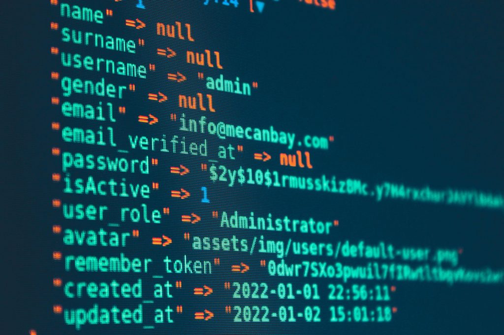 Vibrant close-up of code displayed on a monitor with various programming details.